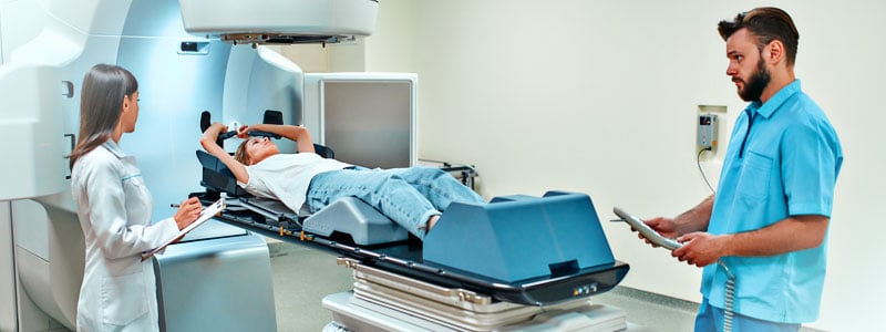 Clinicians working with a patient undergoing a medical scan