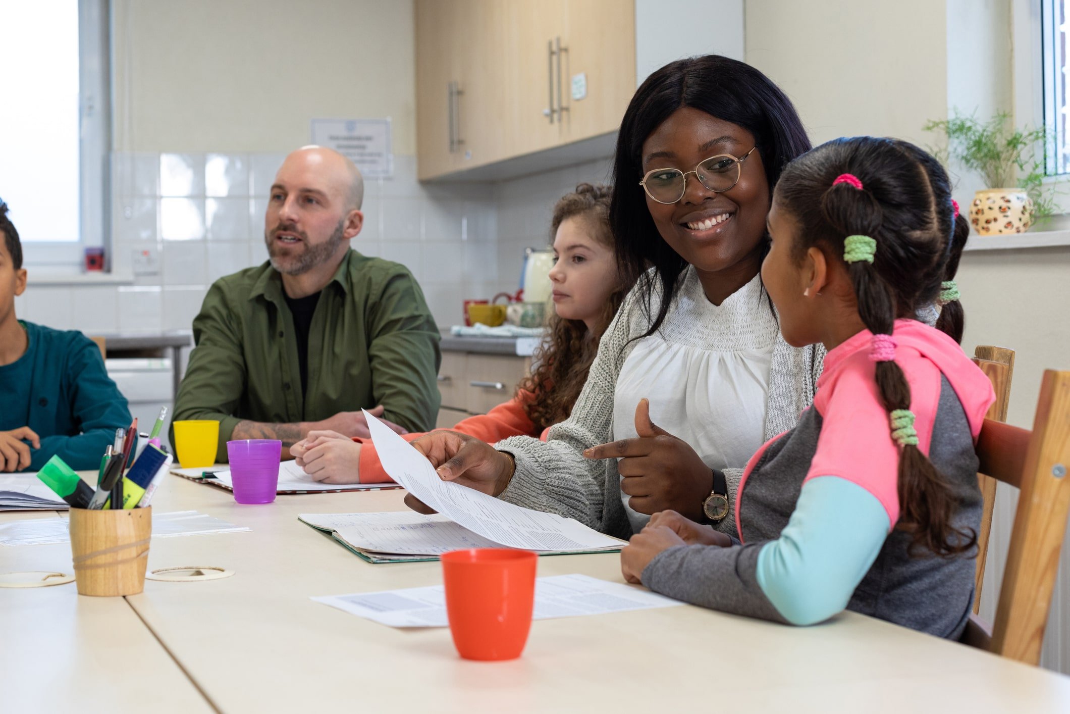 Social worker meeting with family